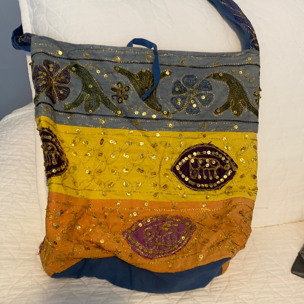 Decorative sling bag